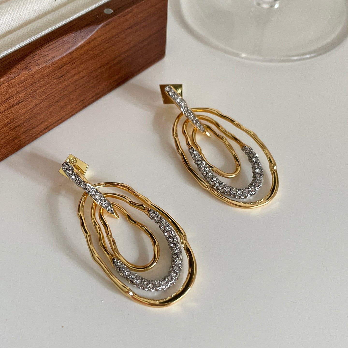 Gold Twisted Hoop Cubic Zirconia Modern Statement Earrings